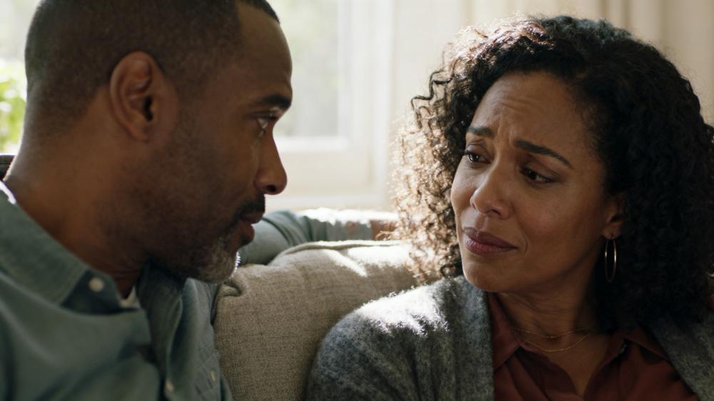 A diverse couple sharing a quiet, connected moment, illustrating the core lesson of how to build intimacy in a relationship.