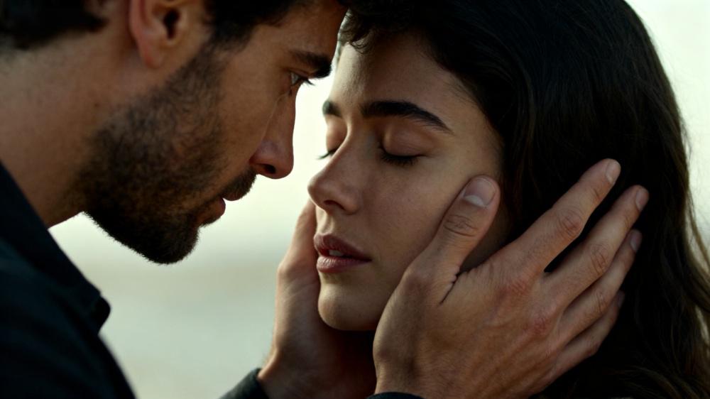Close-up of two hands holding, representing the small, daily habits that build powerful relationship trust and couple bonding.